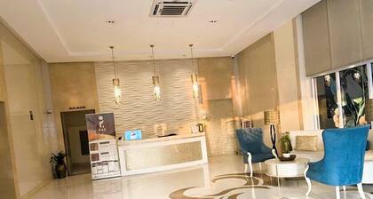 HENRY & ADICHE EMPERADOR BUILDING
