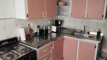 Fridge, stovetop, coffee/tea maker, toaster