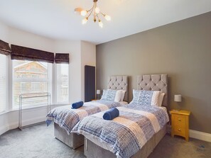 2 bedrooms, desk, iron/ironing board, travel crib