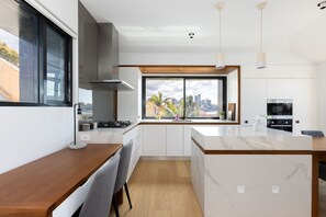 Two Bedroom Penthouse Apartment | Private kitchen | Full-size fridge, microwave, oven, stovetop - Barangaroo Park Apartments by Urban Rest (Millers Point)