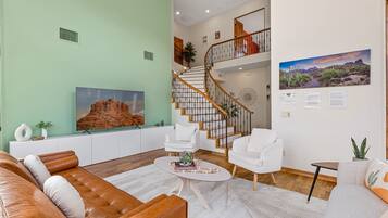 Smart TV, fireplace, foosball, books