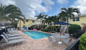 Outdoor pool - Spacious one-bedroom beach apartment on Singer Island (Palm Beach Shores)