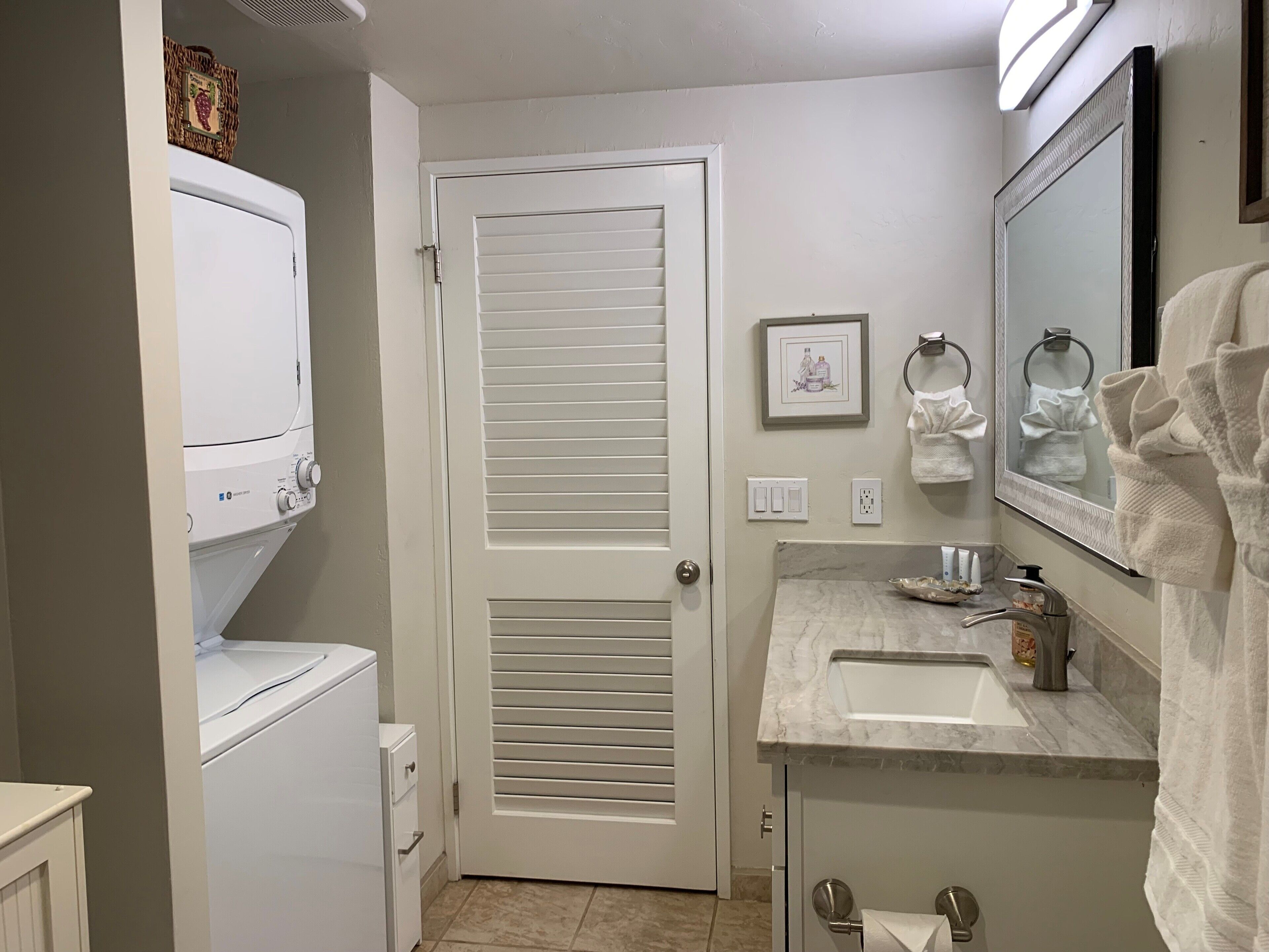 Combined shower/tub, hair dryer, towels, toilet paper