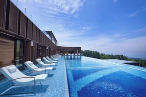 Outdoor pool, open 9:00 AM to 8:00 PM, sun loungers
