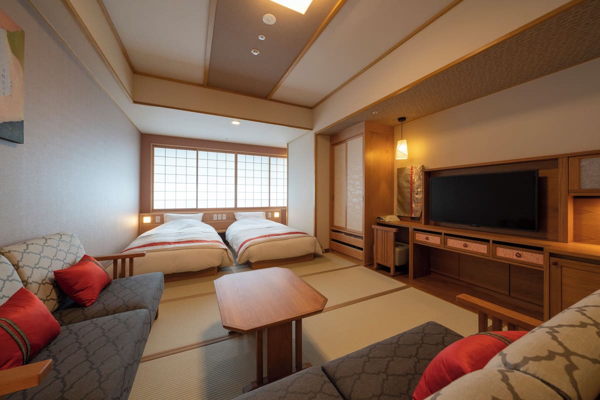 Quadruple Room, Multiple Beds, Non Smoking (with shower only, no bathtub) | In-room safe, desk, iron/ironing board (on request), free WiFi