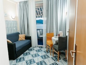 Apartment (One Bedroom Apartment with Balcony an) | Living room