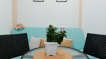 Apartment (One Bedroom Apartment with Terrace) | Living room | 25-inch flat-screen TV with cable channels, TV