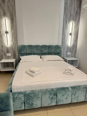 مكواة/لوح كي وملاءات أسرّة