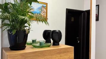 Triple Room, Balcony | Iron/ironing board, bed sheets