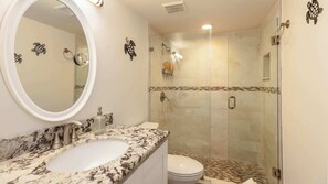 Shower, hair dryer, towels