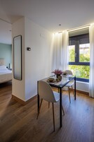 Family Apartment | Living area | 40-inch Smart TV with digital channels, TV, Netflix