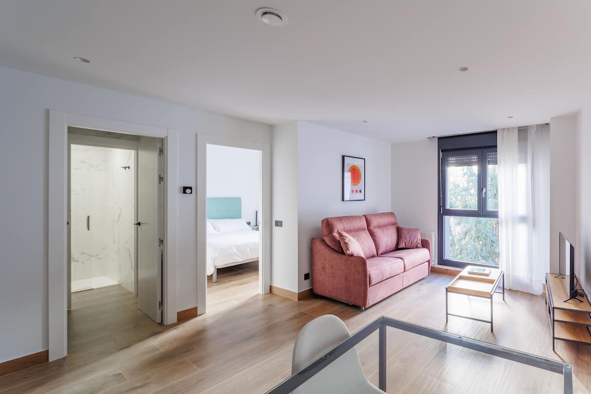 Standard Apartment | Living area | 40-inch Smart TV with digital channels, TV, Netflix