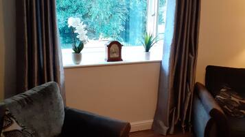 Apartment, 1 Bedroom, Garden View | Living area | Books