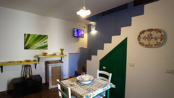 House, 1 Bedroom, Smoking, Balcony | Dining room