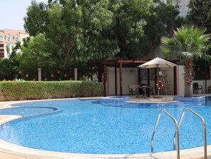 Apartment, 1 Bedroom, Accessible, Balcony | Pool | Outdoor pool - Beautiful Furnished Studio With Close Kitchen (Dubai)