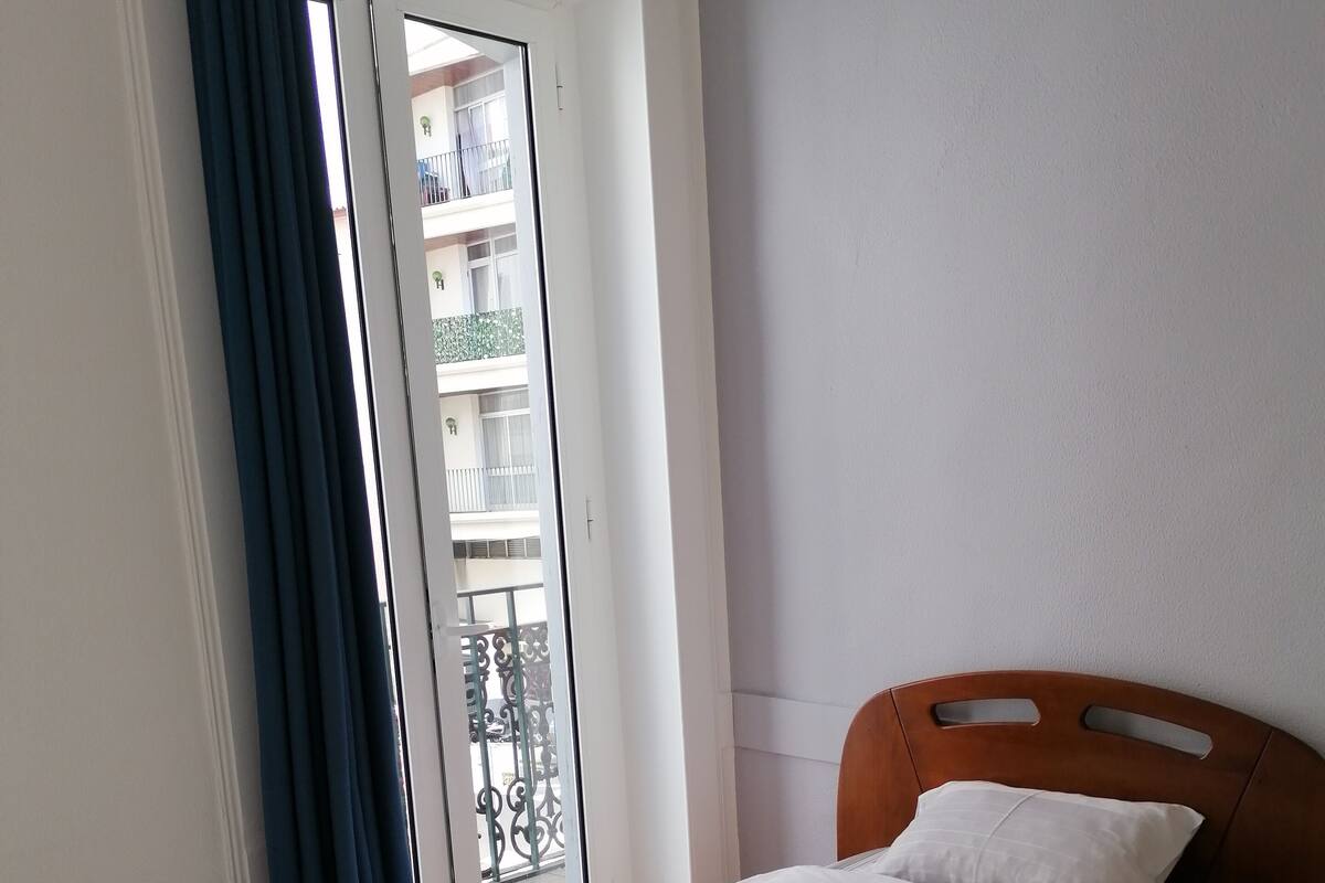 Premium bedding, down duvets, blackout curtains, free WiFi