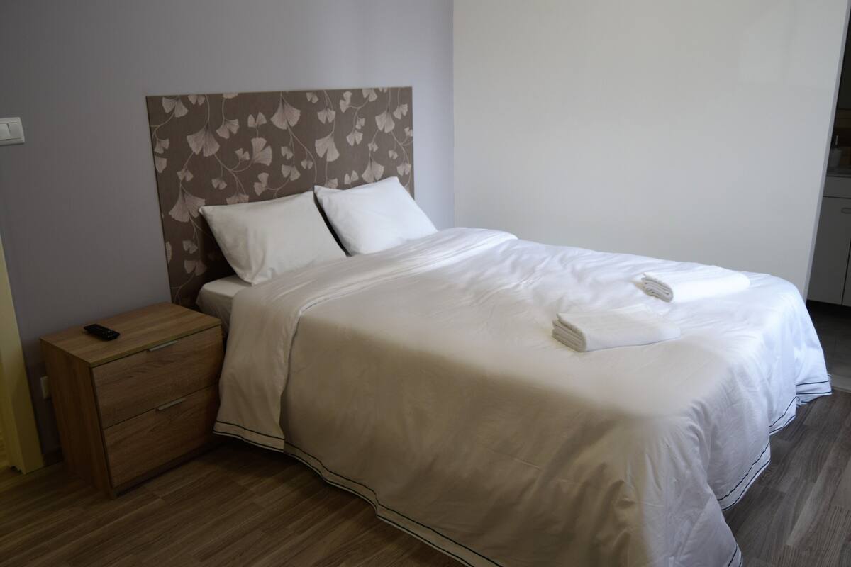 Basic Room | Premium bedding, down comforters, blackout drapes, WiFi (free)