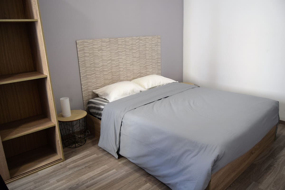 Premium bedding, down duvets, blackout curtains, free WiFi