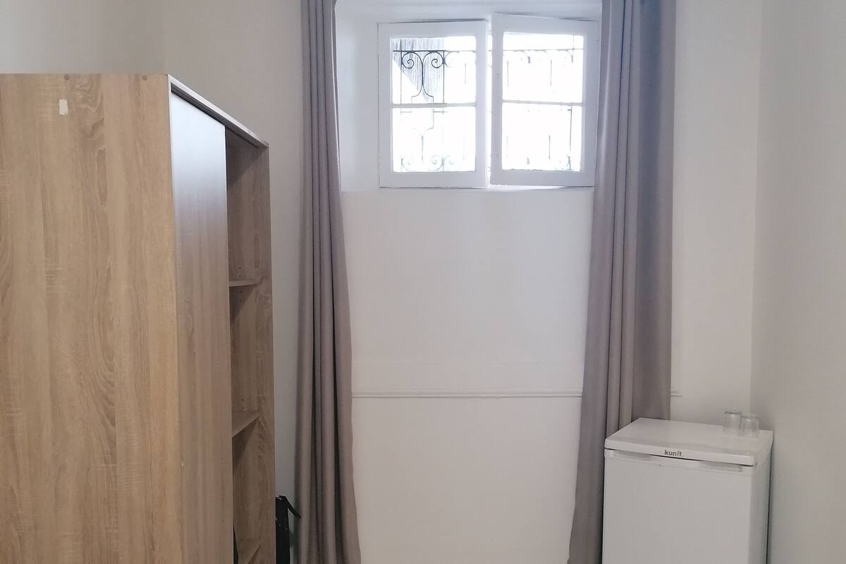 Premium bedding, down duvets, blackout curtains, free WiFi