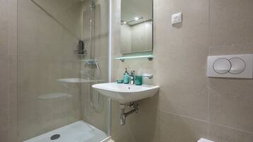 Shower, free toiletries, hair dryer, heated floors