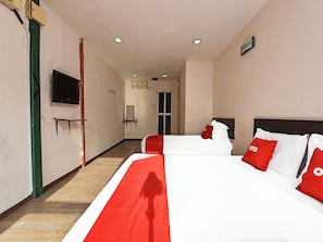 Habitación triple Deluxe | Wifi gratis y ropa de cama