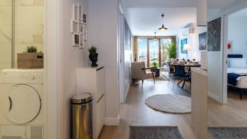Deluxe Condo, Multiple Beds, Sea View | Living area | 50-inch LED TV with satellite channels, TV, Netflix