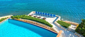 Cayman Castle: Luxury Gated Estate w/Elevated Views, Infinity Pool + Large Priva