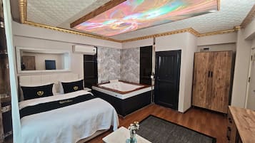 Egyptian cotton sheets, premium bedding, down duvets, minibar