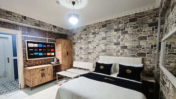 Egyptian cotton sheets, premium bedding, down duvets, minibar