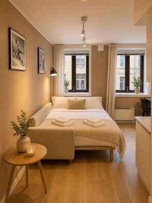 Estudio | Tabla de planchar con plancha, wifi gratis, ropa de cama