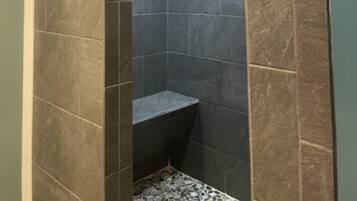 Combined shower/tub, hair dryer, towels, toilet paper