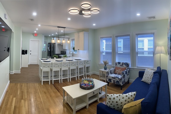 Open living room and kitchen. Perfect for gathering.