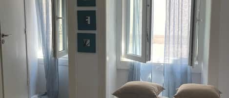 1 غرفة نوم ومكواة/لوح كي وواي فاي وملاءات أسرّة