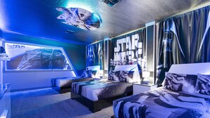 A Star Wars-themed bedroom with two beds, a large window, and a ceiling mural. - Grand Opening! 9BD/5BA-Storey Lake Resort/Lake View/GameRoom (Kissimmee)