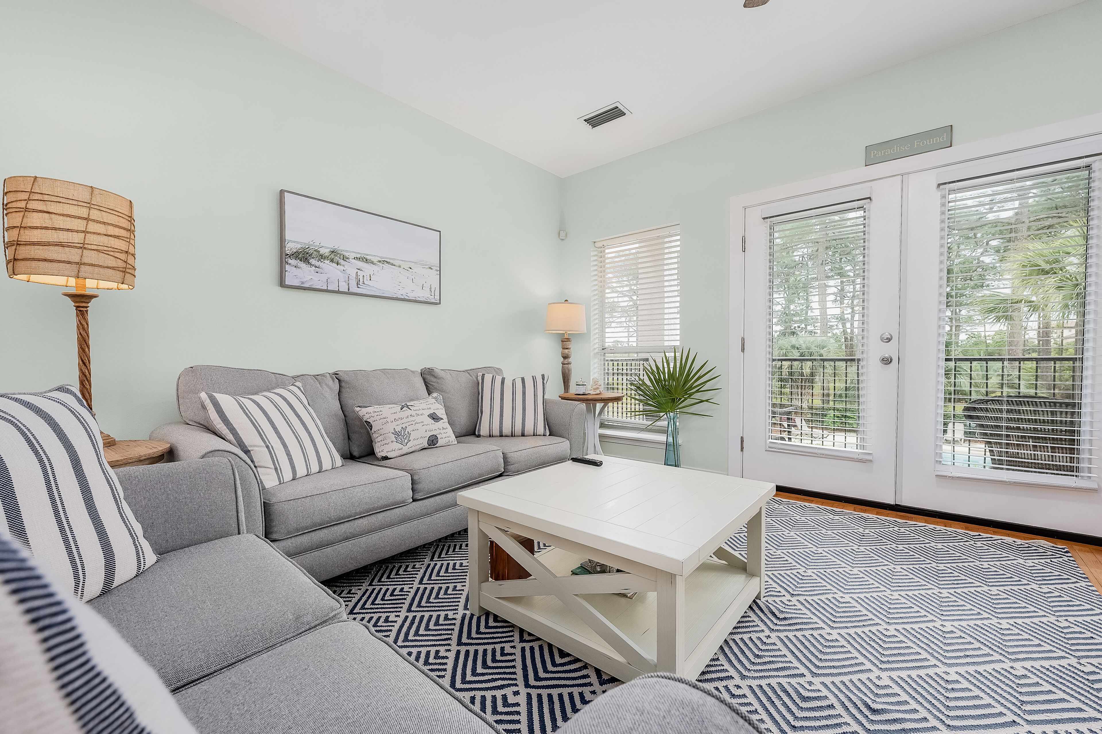 Dog-friendly home with pool, ocean view, central AC, six-seater golf cart & bike