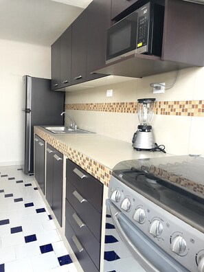 Fridge, microwave, oven, stovetop