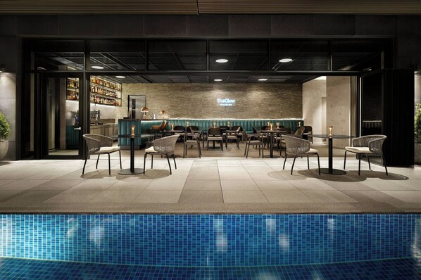 Seasonal outdoor pool, open 9:00 AM to 11:30 PM, pool loungers