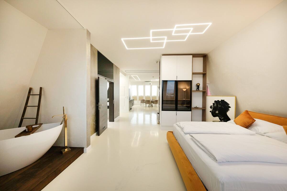 presidential studio suite | premium bedding, down duvets, minibar, in-room safe