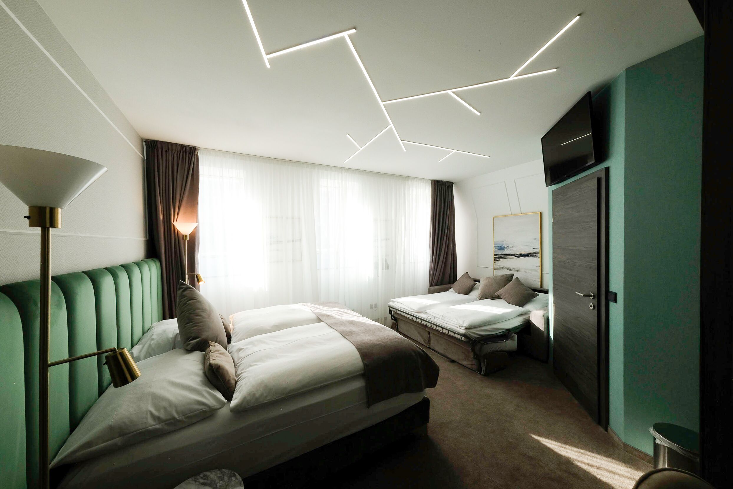 Superior-Vierbettzimmer | Hochwertige Bettwaren, Daunenbettdecken, Minibar, Zimmersafe