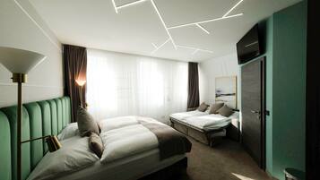 Superior-Vierbettzimmer | Hochwertige Bettwaren, Daunenbettdecken, Minibar, Zimmersafe