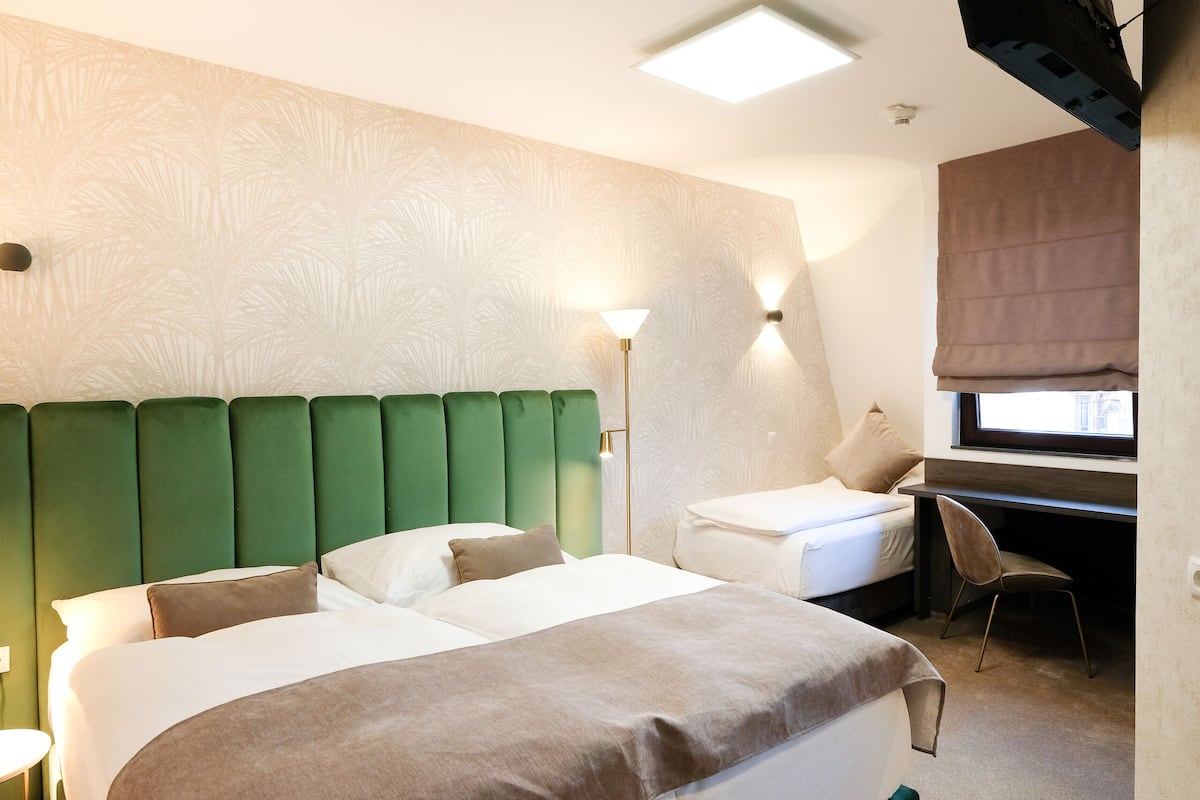 comfort triple room | premium bedding, down duvets, minibar, in-room safe