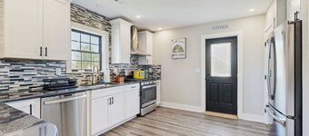 Fully renovated ranch home with large patio and firepit