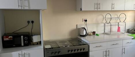 Apartment | Private kitchen | Fridge, microwave, oven, stovetop