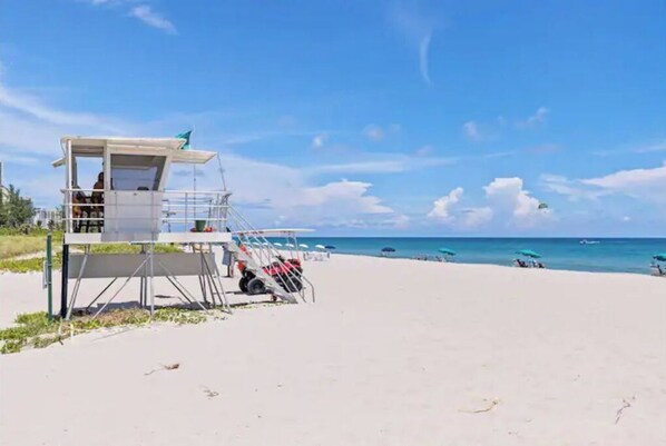 Oversee the beach from the lifeguard tower, which offers a platform and ladder for easy access.