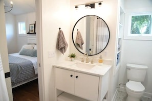 Bathtub, hair dryer, towels