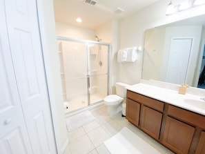 Shower, hair dryer, towels, soap