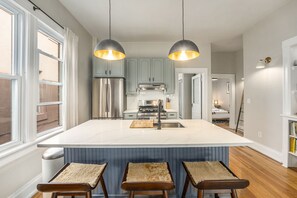 Fridge, microwave, oven, stovetop - Boho-Chic Three Bedroom Bungalow in Sloan's Lake (Denver)