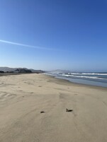 Beach nearby, white sand, sun loungers, beach umbrellas