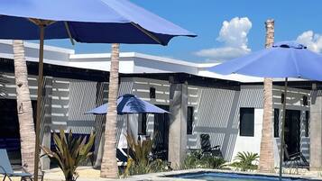 Outdoor pool, open 8:00 AM to 10:00 PM, pool umbrellas, sun loungers