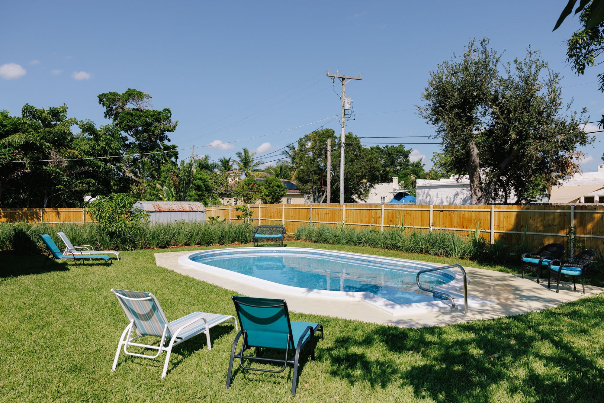 Home by the beach: heated pool with a private yard